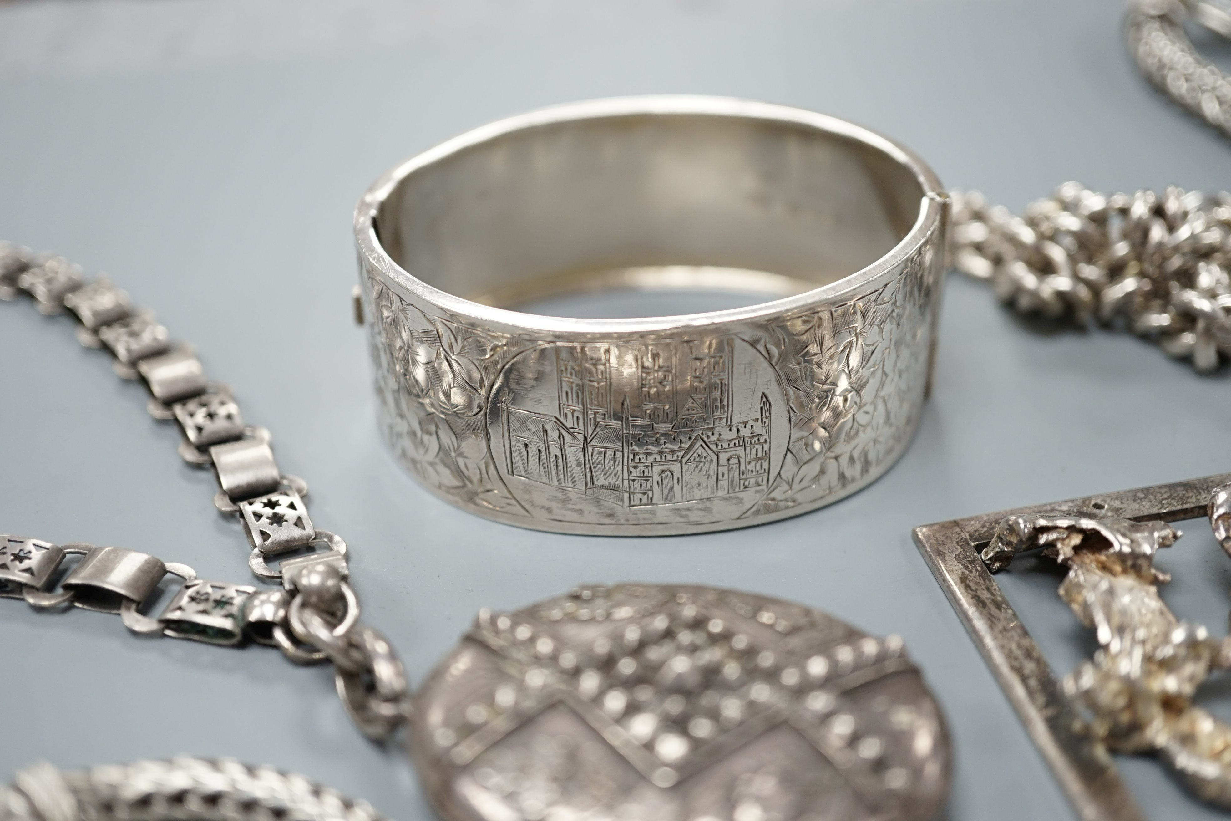 Assorted white metal jewellery including oval locket on albertina, 925 necklace and bracelet, bangles bracelets etc.